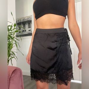 Black satin and lace skirt